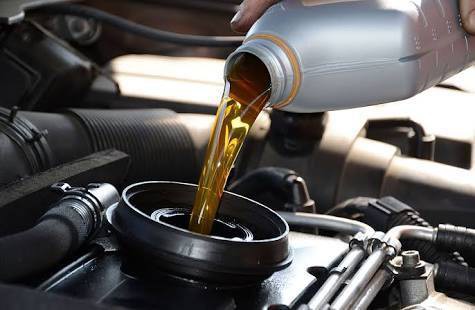 What is the recommended amount of engine oil for my vehicle?